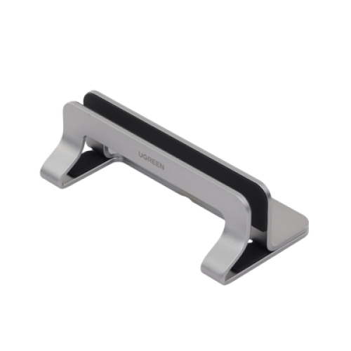Soporte Vertical para Laptop / Adecuado para escritorio / Anchura Ajustable (12-26mm) / Amplia compatibilidad / Anti-Arañazos / Anti-Deslizante /Ajustable Mediante Tornillos / Color Plata / Aluminio + Silicona